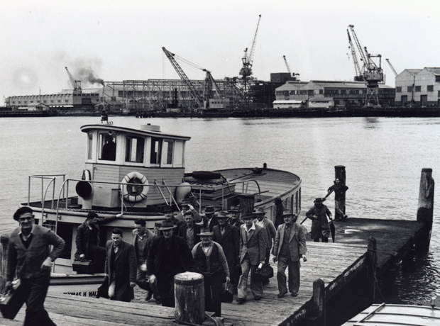 Workers going home after shift at dockyard